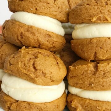 You only need 5 ingredients for the best pumpkin dessert of Fall; pumpkin cheesecake whoopie pies. Fluffy & sweet cheesecake whipped cream in between two soft pumpkin cookies. Not only are these so easy but they will disappear just as fast. 
