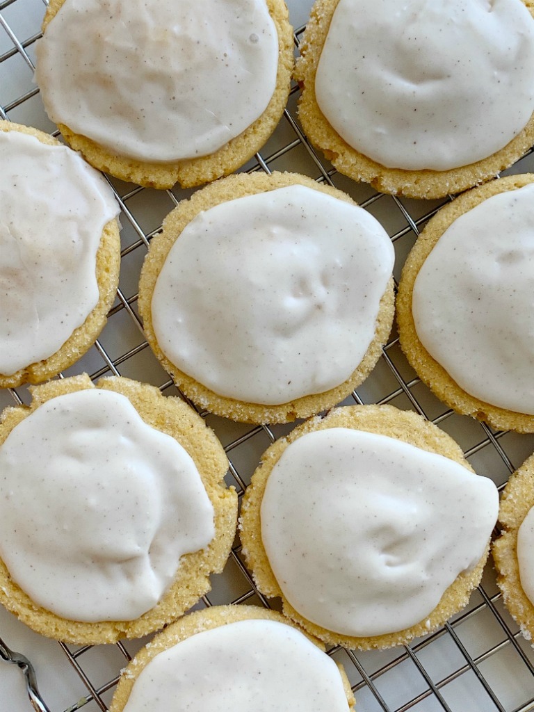 Pumpkin Sugar Cookies with a sweet pumpkin spice glaze. Soft-baked pumpkin cookies with a light and sweet pumpkin flavor. 