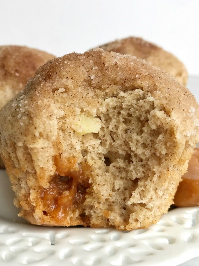 Caramel Apple Muffins are better than the bakery. Loaded with caramel chunks, cinnamon & sugar and apple chunks in a soft muffin recipe | www.togetherasfamily #caramelrecipes #caramel #muffinrecipes #muffins #apple #applerecipes