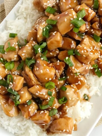 One Pan Chicken Teriyaki | One pan chicken teriyaki is the fastest dinner ever! Only 20 minutes, one pan, and a few simple ingredients are all you need for this delicious dinner recipe. Sweet homemade teriyaki sauce simmers with chunked tender chicken. Serve over rice and garnish with green onions | www.togetherasfamily.com #dinnerrecipes #easydinnerrecipes #chickenrecipes #teriyakichicken #easydinner