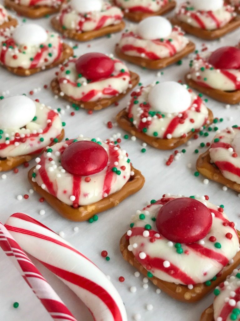 Peppermint Bark Pretzel Bites | white chocolate m&m candy. Perfect for Christmas cookie plates or just a fun Holiday treat | www.togetherasfamily.com #christmascookies #peppermintrecipes #peppermintdesserts #christmasdesserts #candycanerecipes