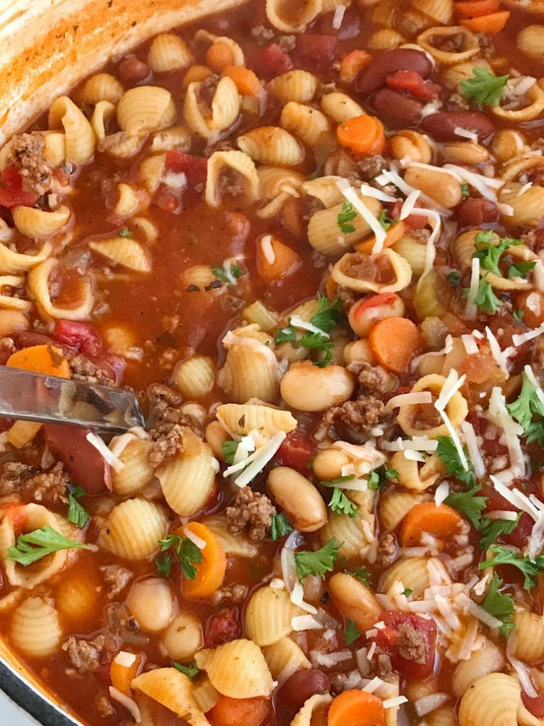 Pasta fagioli soup is so warm, comforting, and bursting with flavor. Convenient canned spaghetti sauce and beef broth form the base for this soup and then it's loaded with ground beef, vegetables, beans, tomatoes, and tender pasta. Serve with garlic bread or crusty rolls and you have a hearty dinner soup. 