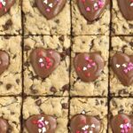 Reese's Hearts Oatmeal Chocolate Chip Cookie Bars | Cookie Bars | Oatmeal Chocolate Chip Cookies | Valentine's Day | Dessert Recipe | Together as Family #valentinesdayideas #reesesrecipes #dessertrecipes
