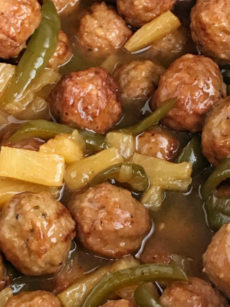Slow Cooker Sweet and Sour Meatballs are an easy & simple dinner that even the kids will gobble up. Prepared frozen meatballs combine with an easy homemade sweet & sour sauce. Serve over rice for a delicious Asian-inspired dinner.