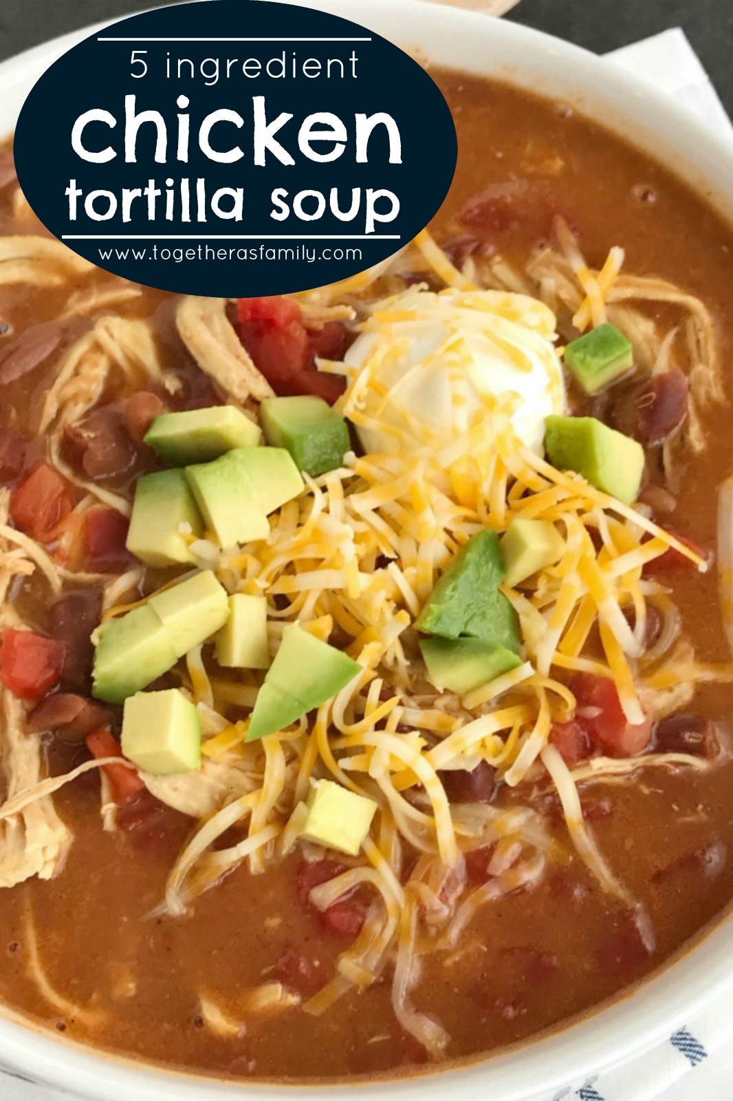 {5 INGREDIENT} CHICKEN TORTILLA SOUP | The best 5 ingredient chicken tortilla soup only takes 20 minutes to make! One pot is all you need for this delicious and creamy tortilla soup. Combine 5 ingredients + some spices and let it simmer on the stove top. Top with cheese, avocado, chips, and sour cream. #souprecipes #chickentortillasoup #easydinnerrecipes #dinnerideas #chicken #recipeoftheday