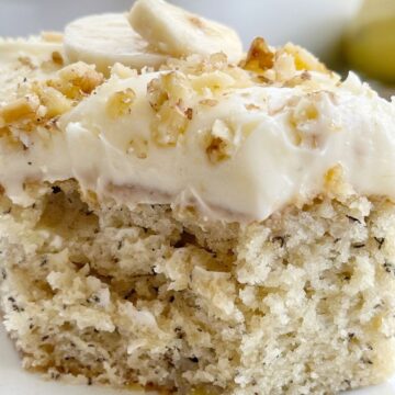 Banana Bread Cake topped with a thick cream cheese frosting.