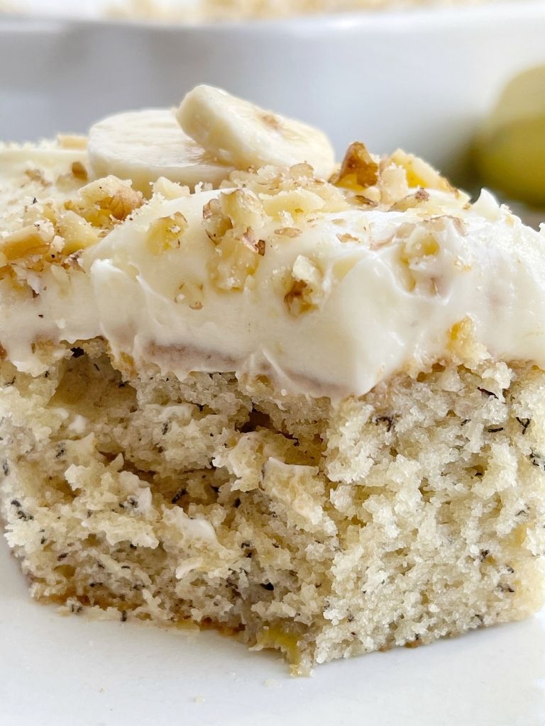 Banana Bread Cake topped with a thick cream cheese frosting.