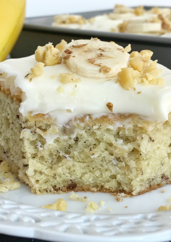 Banana Bread Cake w/ Cream Cheese Frosting | Banana Cake | Banana Desserts | Cream Cheese Frosting | Banana bread cake topped with a thick cream cheese frosting, and baked up perfectly in a 9x13 baking dish. So much banana flavor, so soft & moist, and just crazy delicious. Garnish with sliced fresh bananas and chopped walnuts for an amazing dessert! Together as Family