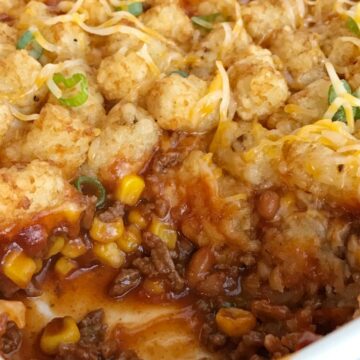 BBQ Beef Sloppy Joe Tater Tot Casserole | Sloppy joe tater tot casserole is a family favorite dinner. Seasoned bbq ground beef is topped with cheese and mini tater tots that are cooked to crispy perfection. Kids love this sweet bbq tater tot casserole | Together as Family #casserolerecipes #easydinnerrecipes #groundbeefrecipes
