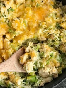 One Pot Cheesy Chicken Broccoli & Rice | One pot cheesy chicken broccoli rice is a quick & easy skillet dinner that is also gluten-free! Only a few simple ingredients and you have a delicious, cheesy, family-friendly skillet dinner. #onepotdinner #skilletdinnerrecipes #easydinnerrecipes #chickenrecipes