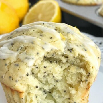 Coconut Lemon Poppyseed Muffins | Perfect coconut lemon poppyseed muffins are a must make for Easter and springtime. Coconut and lemon combine in a soft & moist poppyseed muffin with a lemon glaze on top. These muffins are filled with coconut oil, coconut extract, fresh lemon zest & juice, and poppyseeds #muffins #muffinrecipes