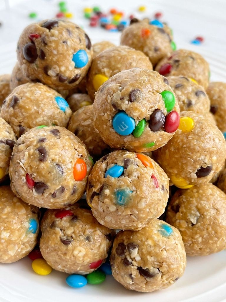 Monster cookie energy balls with only 6 ingredients like oats, peanut butter, honey, chocolate chips, and m&m.
