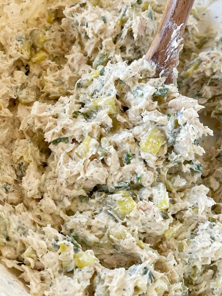 Dill pickle chicken salad recipe with cooked chicken, dill pickles, green onions in a cream cheese and dill pickle creamy dressing. 