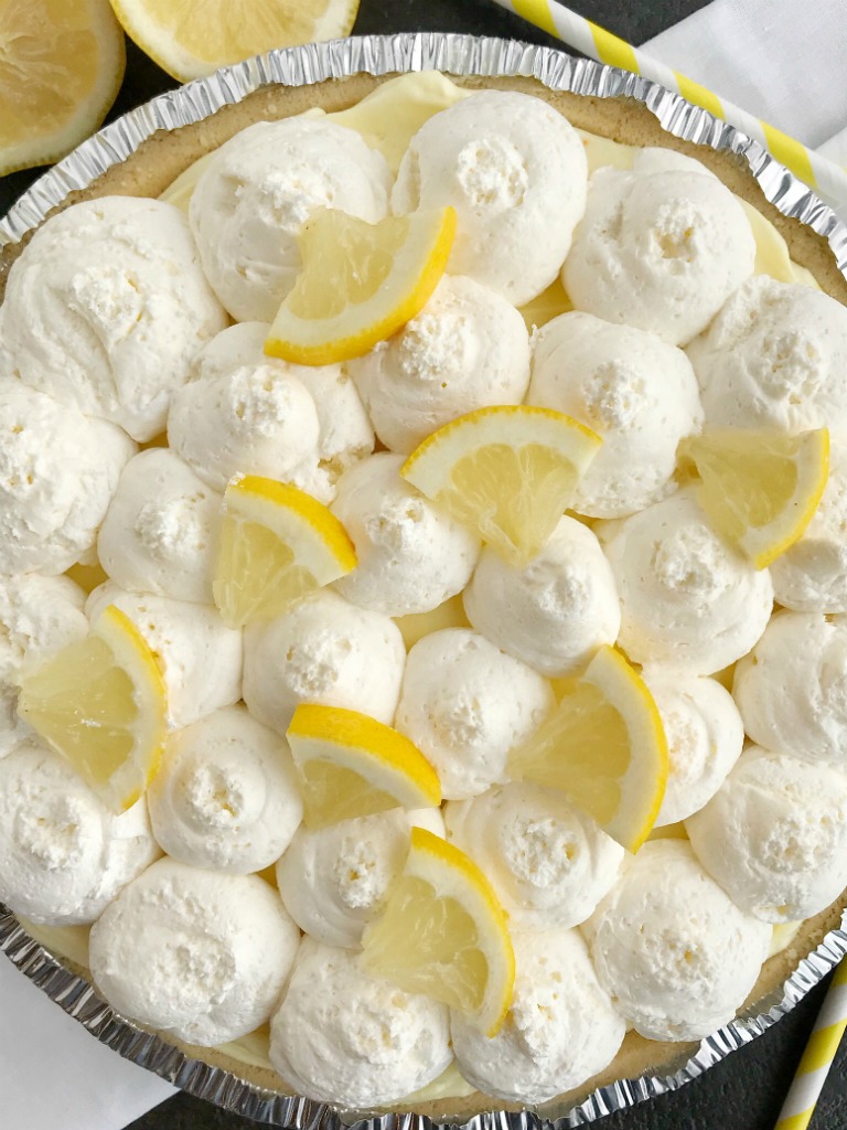 Lemon Cheesecake Cream Pie is a no bake dessert that is so creamy and bursting with fresh and sweet lemon flavor! Perfect for a summer dessert, at a bbq, or picnic. It's also a make ahead dessert that is so pretty and perfect for summer.