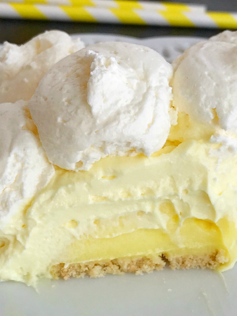 Lemon Cheesecake Cream Pie is a no bake dessert that is so creamy and bursting with fresh and sweet lemon flavor! Perfect for a summer dessert, at a bbq, or picnic. It's also a make ahead dessert that is so pretty and perfect for summer.