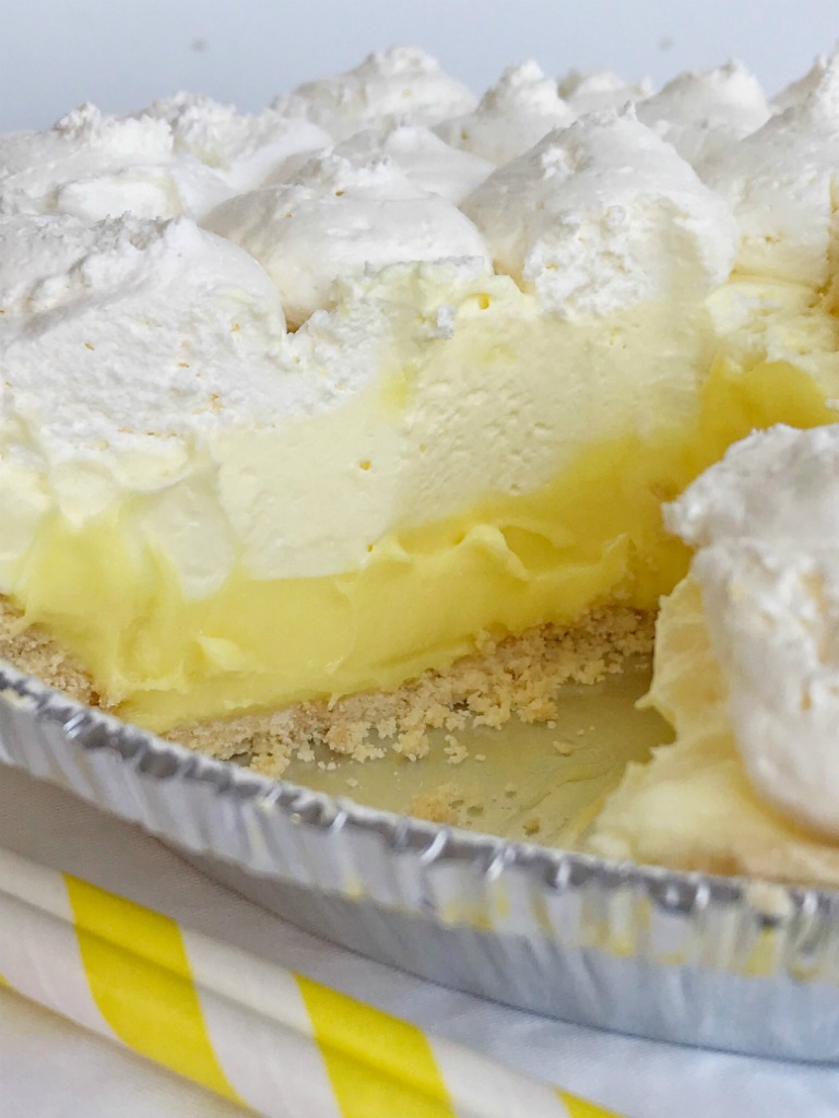 Lemon Cheesecake Cream Pie is a no bake dessert that is so creamy and bursting with fresh and sweet lemon flavor! Perfect for a summer dessert, at a bbq, or picnic. It's also a make ahead dessert that is so pretty and perfect for summer.