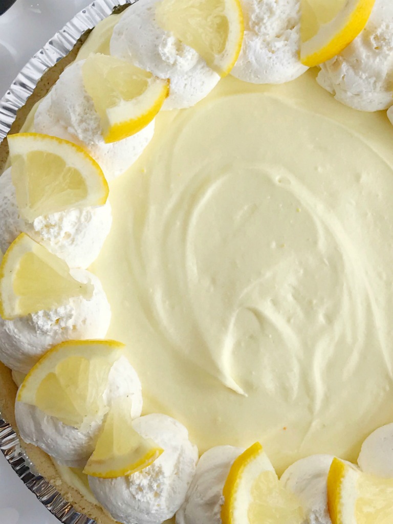 Lemon Cheesecake Cream Pie is a no bake dessert that is so creamy and bursting with fresh and sweet lemon flavor! Perfect for a summer dessert, at a bbq, or picnic. It's also a make ahead dessert that is so pretty and perfect for summer.