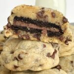 Chocolate Oreo Stuffed Chocolate Chip Cookies | Just when you think the classic chocolate chip cookie couldn't get any better, stuff an Oreo in the middle and it's to die for. Soft-baked, buttery chocolate chips cookies with an chocolate Oreo in the middle #cookierecipes #cookies #oreorecipes