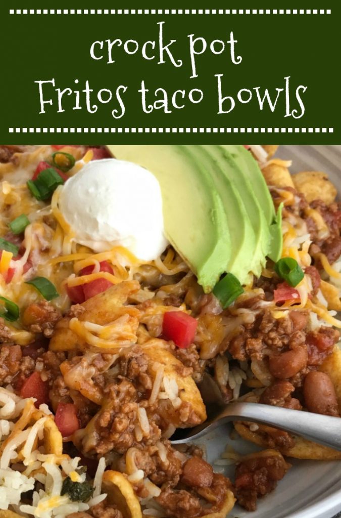 Crock Pot Fritos Taco Bowls | Beef Recipes | Taco Bowl | Slow Cooker Recipes | Crock Pot Fritos Taco Bowls are a family favorite! A beefy taco mixture simmers in the crock pot all day and then gets piled on top of Fritos, rice, and all your favorite taco toppings. This is a dinner that everyone will be begging for more of. #easydinnerrecipes #tacobowls #dinner #crockpotrecipes #slowcooker