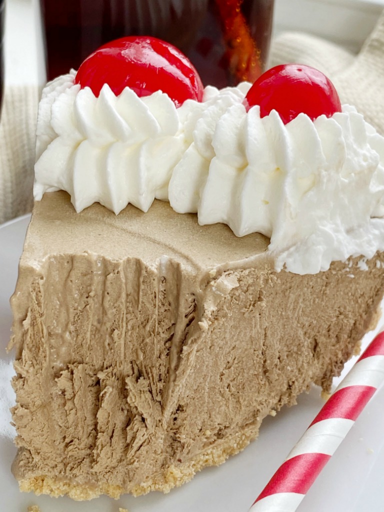 Creamy, cool, light & refreshing! This Root Beer Float Pie is the perfect treat on those hot summer days. Only a few minutes of prep and then some freezer time and you have an easy, no bake pie that tastes EXACTLY like a root beer float! 