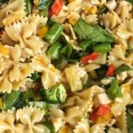 Teriyaki Chicken Pasta Salad | Pasta Salad | Side Dish | Chicken | Teriyaki | Teriyaki Chicken Pasta Salad is a fun twist to traditional pasta salad. Chunks of chicken, bell peppers, spinach, broccoli, snap peas, mandarin oranges, and pineapple tidbits covered in an easy and homemade teriyaki dressing. #recipe #salad #pastasalad #chicken
