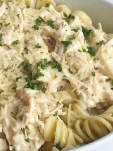 Slow Cooker Creamy Italian Chicken | Crock Pot Recipe | Chicken | Dinner Recipe | Slow cooker creamy Italian chicken is an easy and creamy delicious dinner. It's a dump & go slow cooker meal that takes just minutes to prepare and then it's ready when you are. The chicken is fall apart tender and it makes the most amazing creamy Italian sauce. Serve over pasta or rice for a delicious dinner. #easydinnerrecipe #chicken #slowcooker #crockpot
