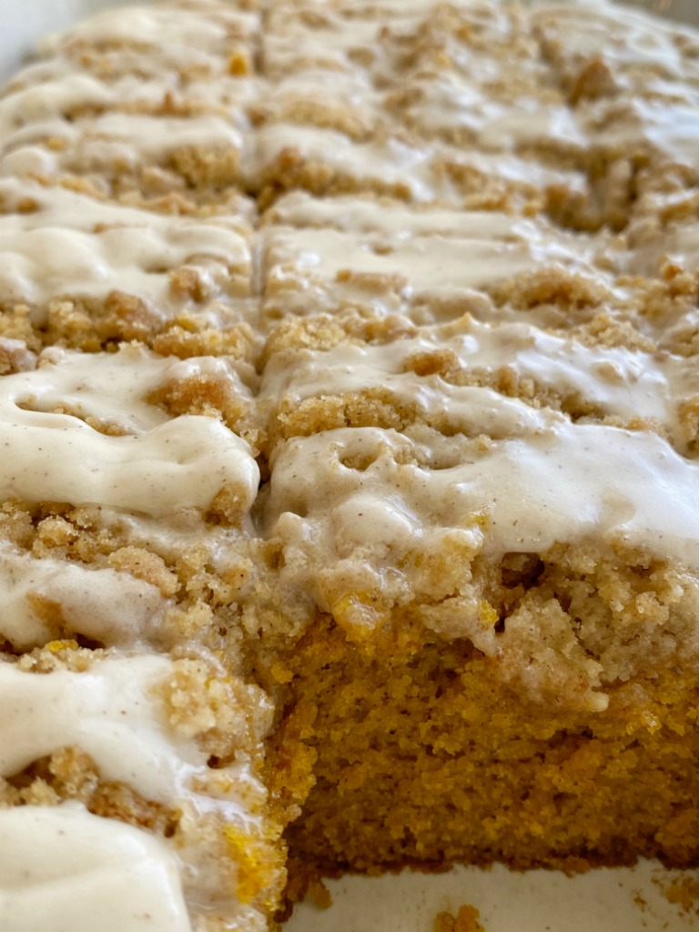 Moist and tender pumpkin cake loaded with warm pumpkin spices and topped with a sweet cinnamon & brown sugar streusel. Mix up a simple vanilla glaze to drizzle over the top. This streusel pumpkin cake is the best Fall pumpkin dessert recipe!