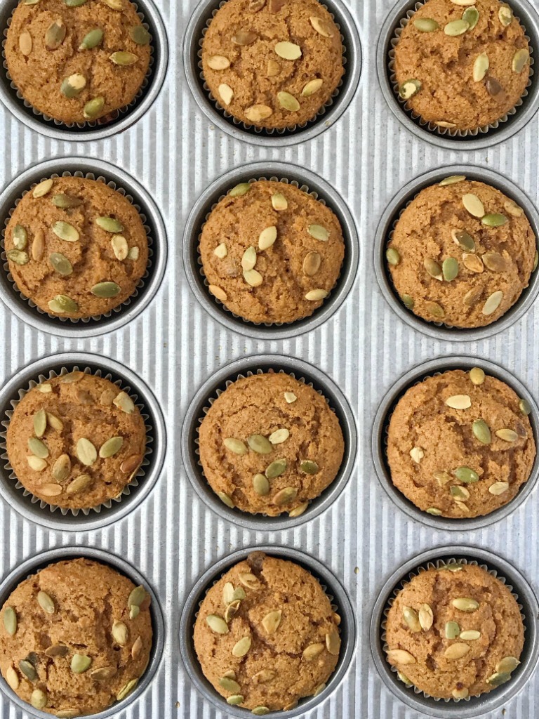 Honey Wheat Pumpkin Muffins | Pumpkin Muffin Recipe | Pumpkin Recipe | Healthy honey wheat pumpkin muffins have no white flour or white sugar and are only one bowl! Made with honey, whole wheat flour, brown sugar, pumpkin, and warm pumpkin spice. Top with some pepitas for the best pumpkin muffin recipe. #pumpkin #pumpkinrecipes #muffins #pumpkinmuffins #fallrecipe 