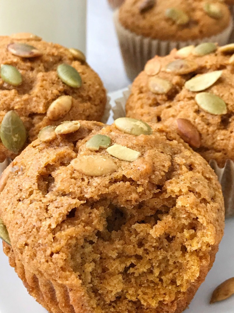 Honey Wheat Pumpkin Muffins | Pumpkin Muffin Recipe | Pumpkin Recipe | Healthy honey wheat pumpkin muffins have no white flour or white sugar and are only one bowl! Made with honey, whole wheat flour, brown sugar, pumpkin, and warm pumpkin spice. Top with some pepitas for the best pumpkin muffin recipe. #pumpkin #pumpkinrecipes #muffins #pumpkinmuffins #fallrecipe