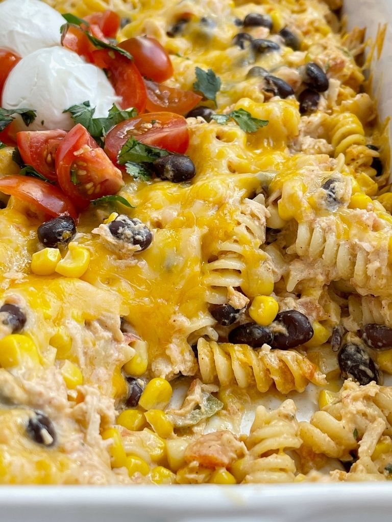 Casserole recipe with chunks of chicken, black beans, and corn in a cheesy one dish recipe.