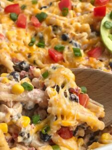 Fiesta Chicken Pasta Casserole | Chicken Casserole | Pasta | Dinner Recipe | Fiesta chicken casserole is filled with chunks of chicken, tender pasta, corn, black beans, all in a one dish cheesy chicken casserole. Simple to make and a great way to use up leftover chicken or a Rotisserie chicken. #dinner #easydinnerrecipe #chickenrecipes #casserole #recipeoftheday