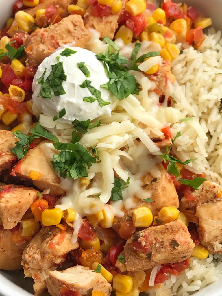 Tex-Mex Chicken | Chicken Recipes | Dinner Recipe | Slow Cooker | Crock Pot | Tex-Mex chicken is made in the slow cooker with only 5 easy ingredients plus some seasonings! Set it and forget it dinner that is ready when you are and it's healthy & nutritious. Serve as rice bowls, inside burritos, on top of nachos, or any other way you want. #chicken #chickenrecipe #slowcooker #crockpot #easydinnerrecipes #dinner #healthy #recipeoftheday