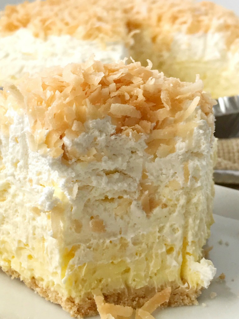 Coconut Cheesecake Cream Pie | Coconut Cream Pie | No Bake Pie Recipe | Coconut cream pie with a cheesecake twist. Easy and simple thanks to the coconut pudding mix and Nilla wafer crust. It's a no bake pie so it's perfect to make the day ahead to save time! Coconut cheesecake cream pie is a must make for Thanksgiving dessert. #thanksgivingrecipe #nobake #pie #coconut #coconutcreampie #recipeoftheday #dessert #dessertrecipe