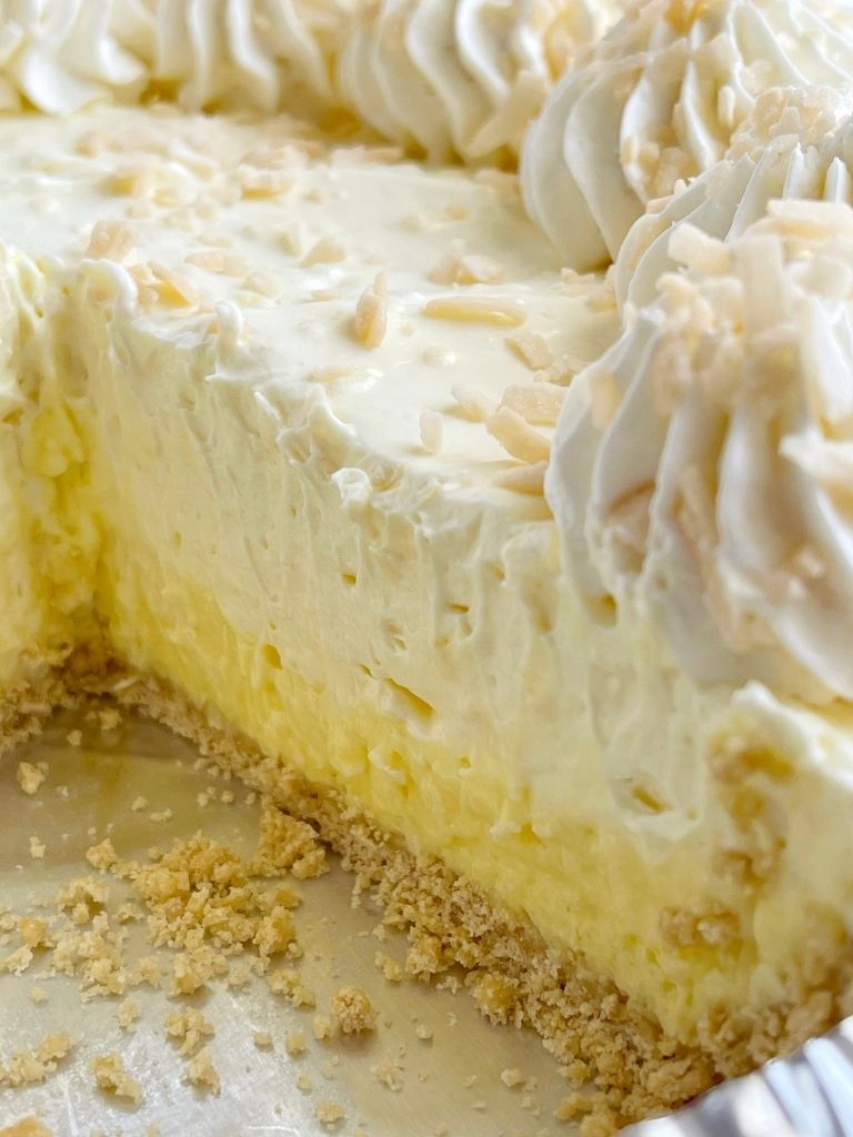 No bake coconut cream pie recipe with toasted coconut on top.