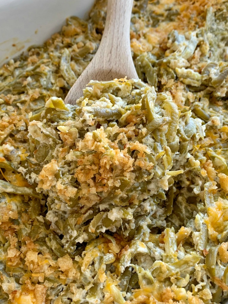 Green bean casserole recipe. Canned green beans, cheese, french fried onions, and a few seasonings is all you need for the best green bean casserole. This green bean casserole has no mushrooms and no creamed soups in it!