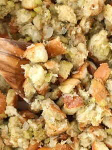 Stove Top Stuffing Recipe | Stuffing Recipe | Homemade Stuffing | Easy homemade stuffing made right on the stove top in just 30 minutes! Crusty bread chunks dried in the oven and then cooked with butter, seasonings, celery, and onion in a pot on the stove. This stove top stuffing will be a family favorite Thanksgiving recipe. #thanksgivingrecipe #stuffing #homemadestuffing #sideidsh #recipeoftheday