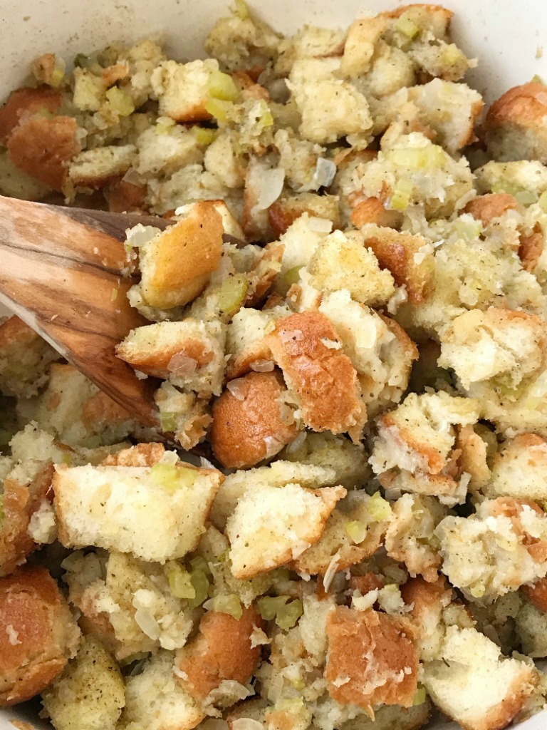 Stove Top Stuffing Recipe | Stuffing Recipe | Homemade Stuffing | Easy homemade stuffing made right on the stove top in just 30 minutes! Crusty bread chunks dried in the oven and then cooked with butter, seasonings, celery, and onion in a pot on the stove. This stove top stuffing will be a family favorite Thanksgiving recipe. #thanksgivingrecipe #stuffing #homemadestuffing #sideidsh #recipeoftheday