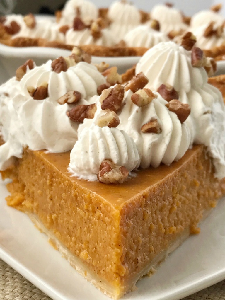 Maple Pumpkin Pie | Pumpkin Pie Recipe | Thanksgiving Recipe | If you love pumpkin pie then you'll want to make this maple pumpkin pie that's sweetened with pure maple syrup. Top off a slice with the pumpkin spiced homemade whipped cream. It's a fun twist to the classic pumpkin pie. #thanksgiving #thanksgivingrecipe #recipeoftheday #pie #pumpkinpie #dessertrecipe