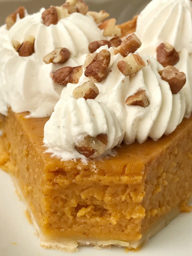 Maple Pumpkin Pie | Pumpkin Pie Recipe | Thanksgiving Recipe | If you love pumpkin pie then you'll want to make this maple pumpkin pie that's sweetened with pure maple syrup. Top off a slice with the pumpkin spiced homemade whipped cream. It's a fun twist to the classic pumpkin pie. #thanksgiving #thanksgivingrecipe #recipeoftheday #pie #pumpkinpie #dessertrecipe