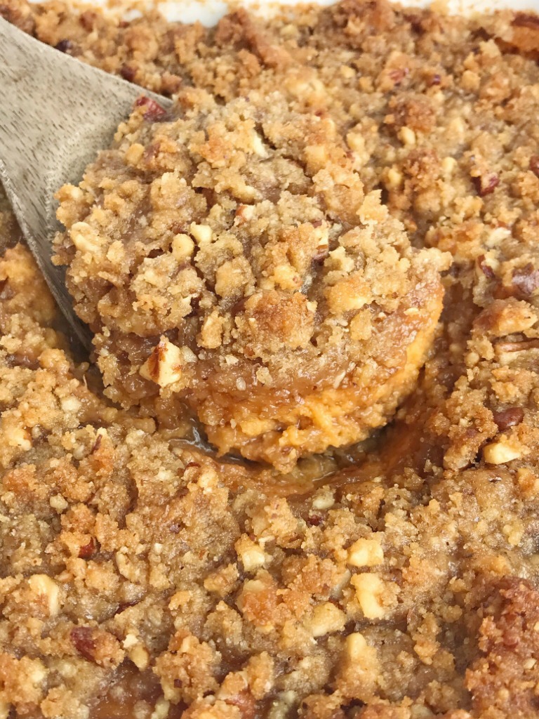 Praline Sweet Potato Casserole | Sweet Potato Casserole | Thanksgiving Recipe | Sweet potato casserole with canned sweet potatoes and a sweet praline crumble topping. This takes just minutes to make thanks to the canned sweet potatoes and no one will ever have to know the delicious shortcut. No heating, boiling, chopping, and mashing sweet potatoes. #thanksgivingrecipes #sweetpotatocasserole #casserole #sidedish #holidayrecipes #recipeoftheday