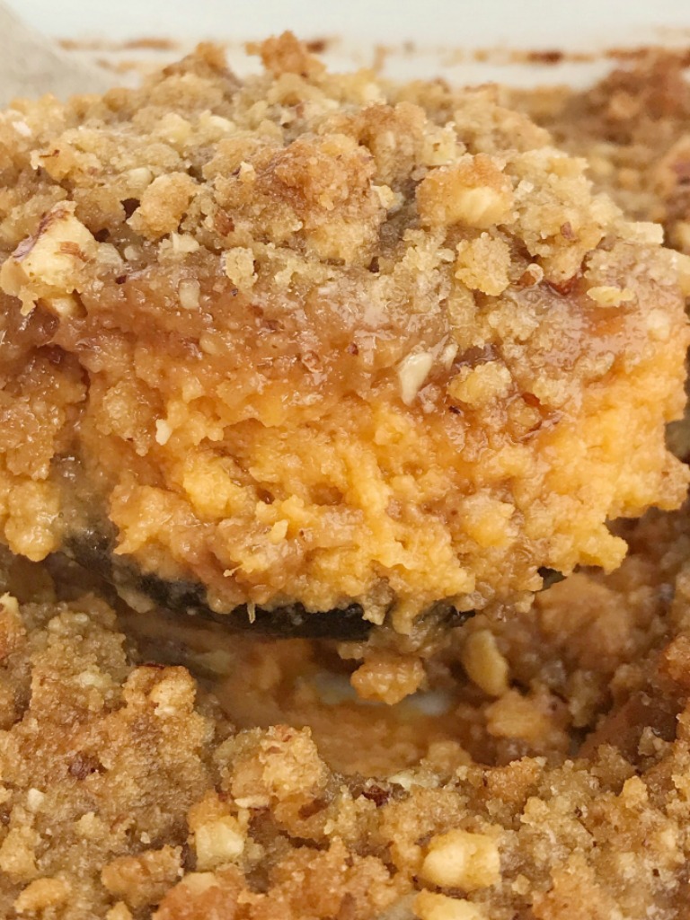 Praline Sweet Potato Casserole | Sweet Potato Casserole | Thanksgiving Recipe | Sweet potato casserole with canned sweet potatoes and a sweet praline crumble topping. This takes just minutes to make thanks to the canned sweet potatoes and no one will ever have to know the delicious shortcut. No heating, boiling, chopping, and mashing sweet potatoes. #thanksgivingrecipes #sweetpotatocasserole #casserole #sidedish #holidayrecipes #recipeoftheday