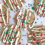 Christmas Gingerdoodle Cookies | Gingersnap Cookies | Gingerbread | Christmas Cookies | Christmas gingerdoodle cookies are a mix of a snickerdoodle cookie and a gingersnap cookies! No crispy cookies with this recipe. Soft, chewy gingersnap cookie that's rolled in sugar. Perfectly spiced that even kids will eat these. Decorate with a drizzle of white chocolate and Christmas sprinkles for the best Christmas cookies.