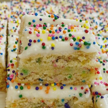Funfetti Cake Batter Cookie Bars are so easy to make with a cake mix and sugar cookie mix, loaded with colorful sprinkles, and tastes exactly like cake batter. These will be a hit with everyone.