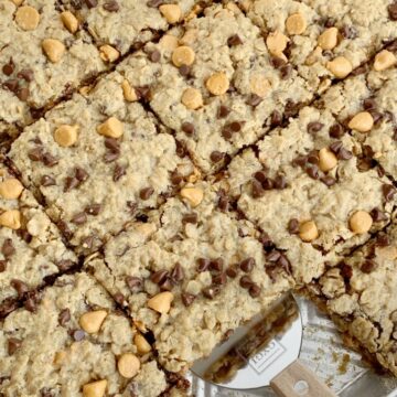 Chewy butterscotch peanut butter cookie bars have no flour! Hearty, chewy, soft baked, and loaded with chocolate and butterscotch chips. This cookie bar recipe makes lots of cookie bars so it's perfect for snacks (freeze extras) or big gatherings.
