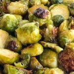 Honey Garlic Brussel Sprouts | Brussel Sprout Recipe | Side Dish | Brussel sprouts roasted in the oven with olive oil, honey, salt, and garlic. So simple, soft and delicious with charred outside. A healthy side dish for dinner. #brusselsprouts #sidedishrecipes #healthyrecipe #recipeoftheday #vegetables