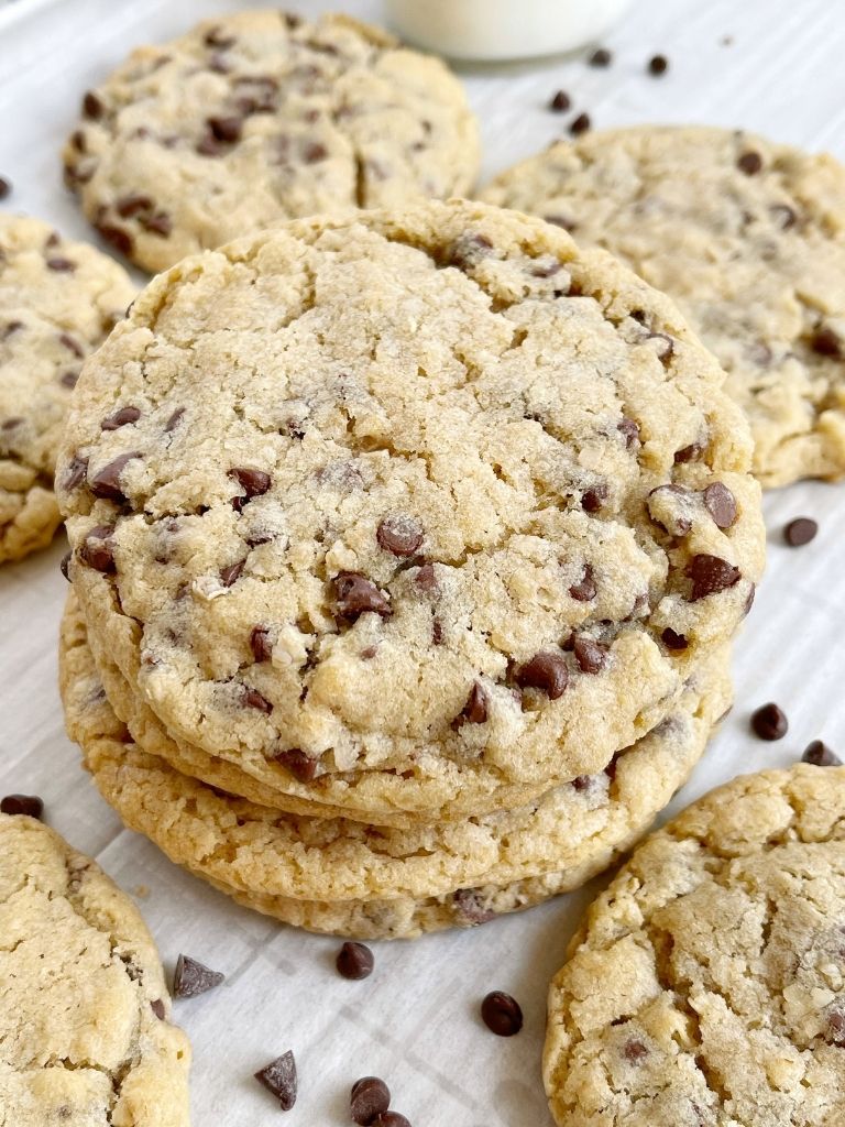 A close up photo of a stack of oatmeal chocolate chip cookies.