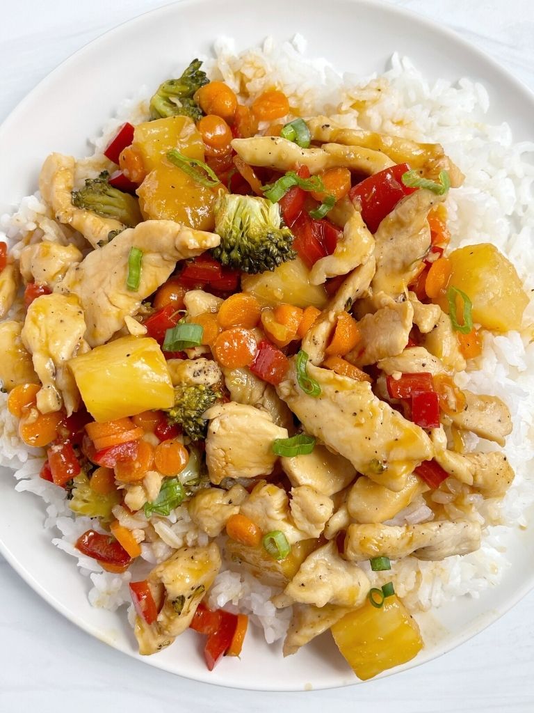 Overhead picture of teriyaki chicken stir fry with pineapple chunks. 
