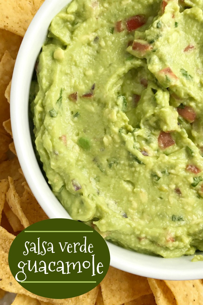 Salsa Verde Guacamole | Guacamole Recipe | Dip Recipe | Appetizers | Guacamole gets so much flavor from salsa verde, tomato, cilantro, smashed avocado, and jalapeno. Serve with tortilla chips for a delicious party appetizer recipe and a fan favorite for a Super bowl game day party. #guacamolerecipe #diprecipes #appetizers #superbowlrecipes #guacamole #avocado #recipeoftheday