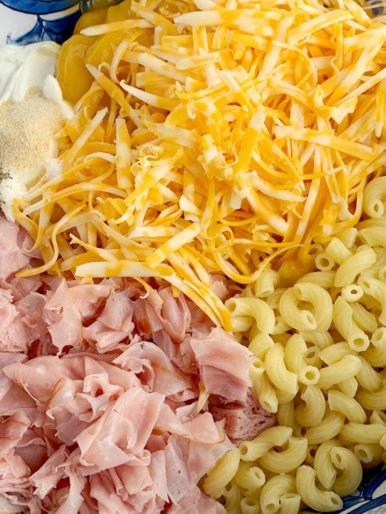 Ingredients you need to make macaroni and cheese ham casserole.