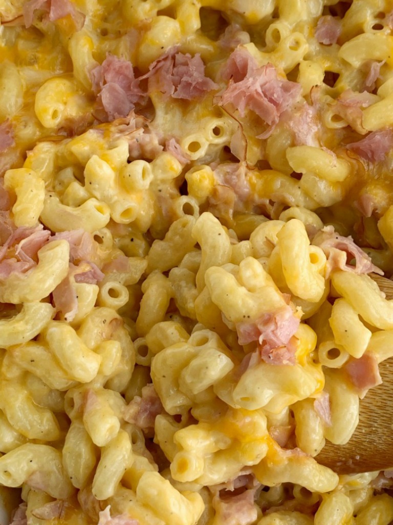 Macaroni and Cheese casserole with ham, cheese soup, and shredded cheese.